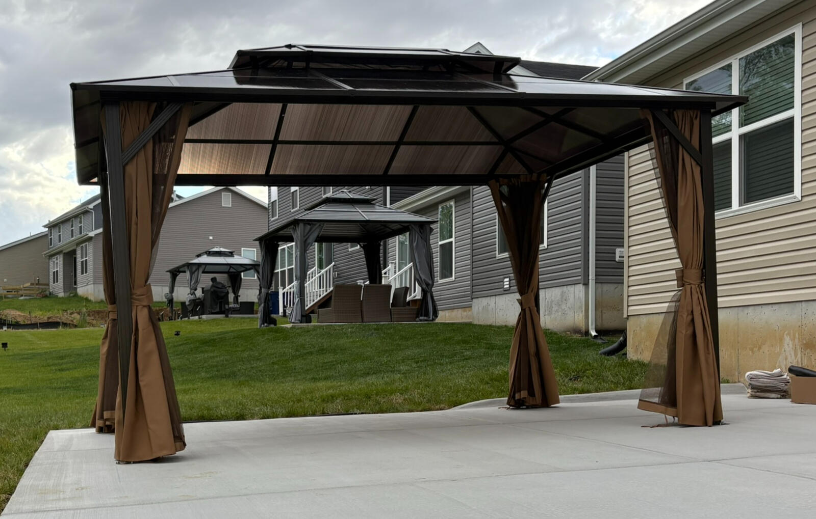 The center gazebo led to the rear, and then to the front — all assembled for great neighbors, all through word of mouth. Grateful for the trust and the opportunity to serve. Thank you for your business!